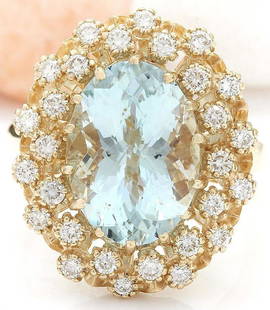 6.40 CTW Natural Aquamarine 18K Solid Yellow Gold Diamond Ring: 6.40 CTW Natural Aquamarine 18K Solid Yellow Gold Diamond Ring Manufacturer's Suggested Retail Price: $ 5000.00 6.40 Carat Natural Aquamarine 18K Solid Yellow Gold Diamond Ring Item Type: Ring