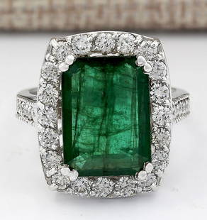 6.00 CTW Natural Emerald And Diamond Ring In 14k White Gold: 6.00 CTW Natural Emerald And Diamond Ring In 14k White Gold Manufacturer's Suggested Retail Price: $ 6300.00 Stamped: 14K Ring Size: 7 Total Ring Weight: 7.5 Grams Diamond Weight: Total