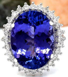 14.25 CTW Natural Tanzanite 18K Solid White Gold Diamond Ring: 14.25 CTW Natural Tanzanite 18K Solid White Gold Diamond Ring Manufacturer's Suggested Retail Price: $ 11500.00 14.25 Carat Natural Tanzanite 18K Solid White Gold Diamond Ring Item Type: Ring 