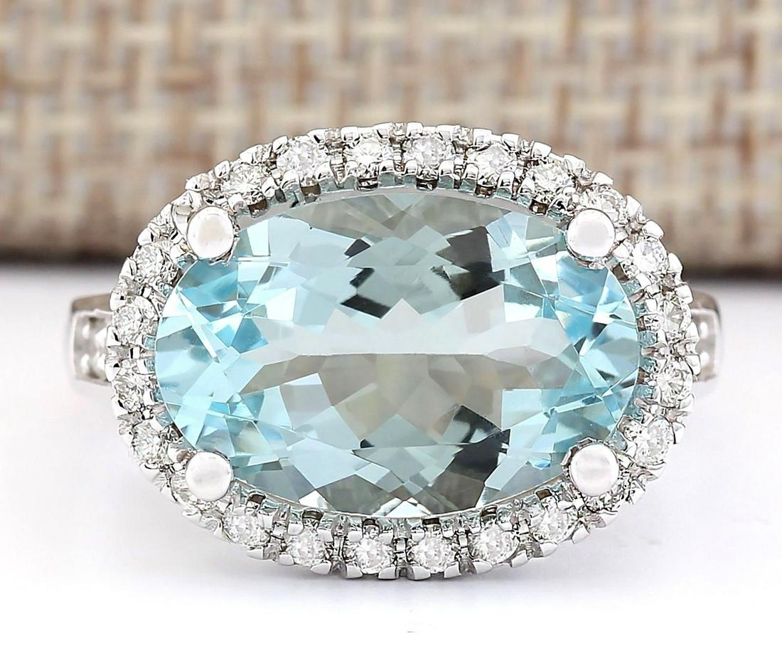 6.04 CTW Natural Aquamarine And Diamond Ring In 18K White Gold: 6.04 CTW Natural Aquamarine And Diamond Ring In 18K White Gold Manufacturer's Suggested Retail Price: $ 4300.00 Stamped: 18K Ring Size: 6.5 Total Ring Weight: 7.8 Grams Diamond Weight: Total Natural d