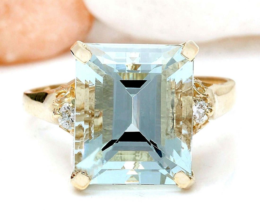 5.16 CTW Natural Aquamarine 18K Solid Yellow Gold Diamond Ring: 5.16 CTW Natural Aquamarine 18K Solid Yellow Gold Diamond Ring Manufacturer's Suggested Retail Price: $ 3100.00 5.16 Carat Natural Aquamarine 18K Solid Yellow Gold Diamond Ring Item Type: Ring Item St