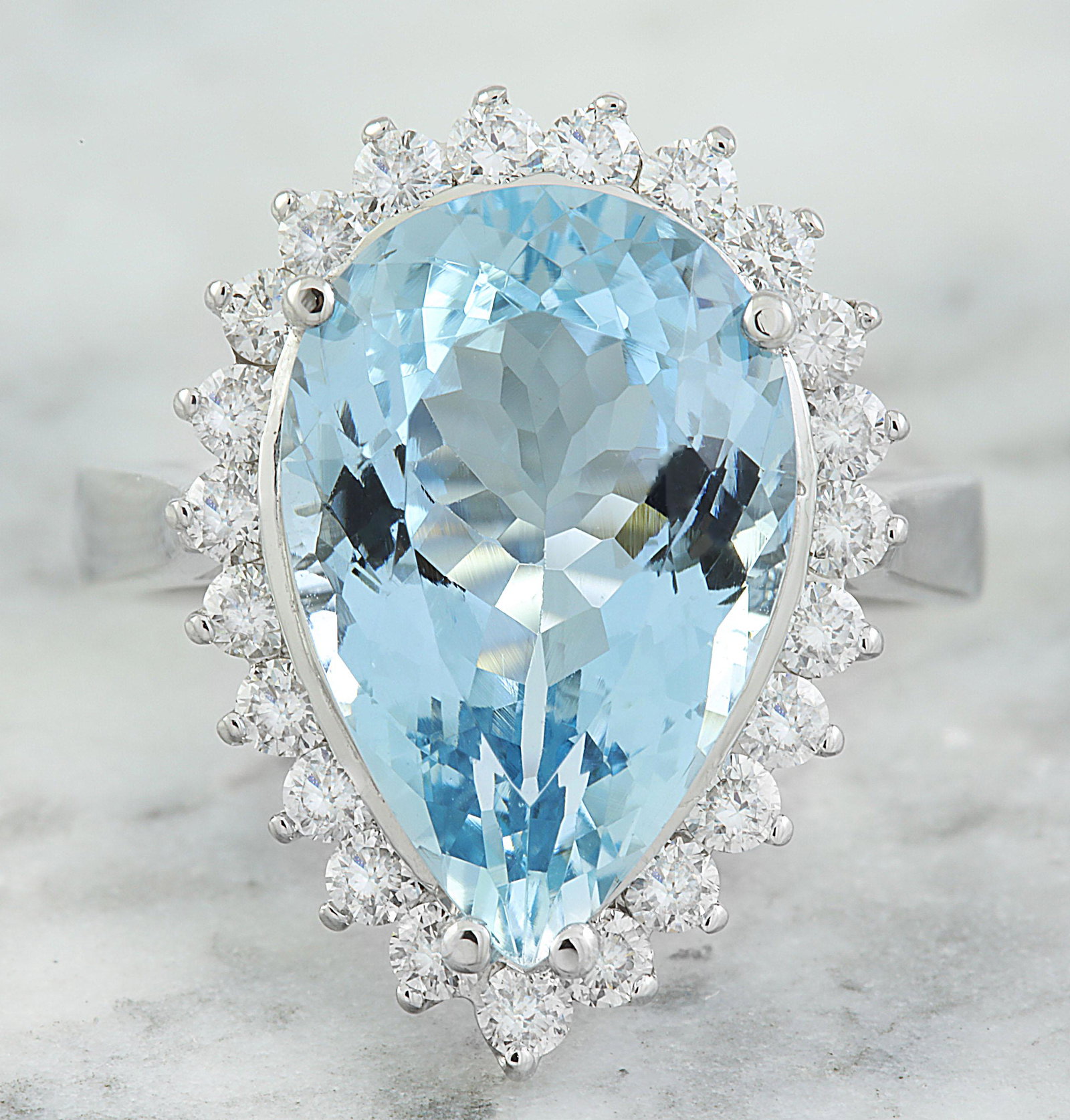 7.65 CTW Aquamarine 18K White Gold Diamond Ring: 7.65 CTW Aquamarine 18K White Gold Diamond Ring Manufacturer's Suggested Retail Price: $ 4700.00 Stamped: 18K Total Ring Weight: 6.3 Grams Aquamarine Weight 6.80 Carat (16.50x11.00 Millimeters) Diamon