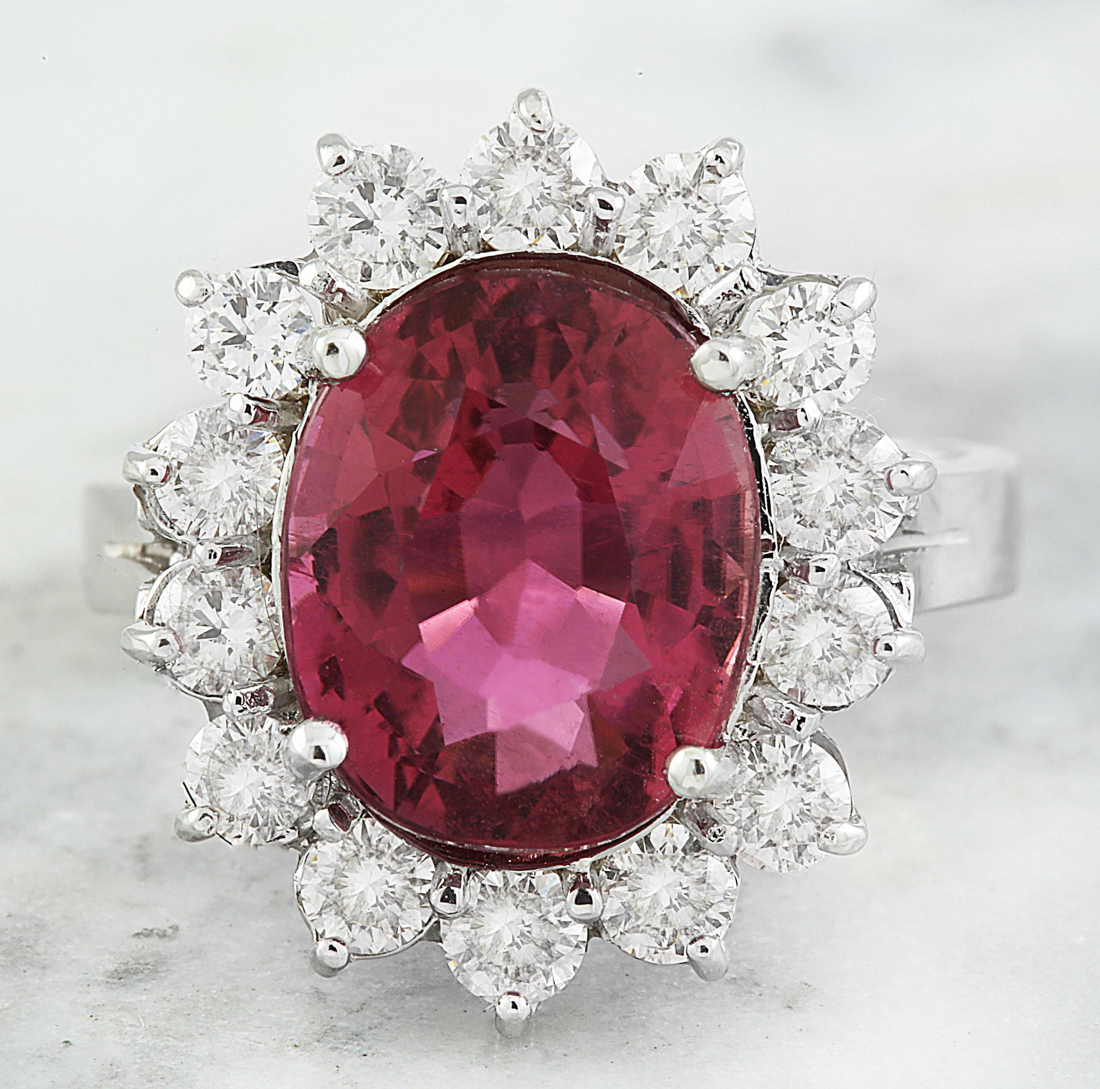 7.07 CTW Tourmaline 14K White Gold Diamond ring: 7.07 CTW Tourmaline 14K White Gold Diamond ring Manufacturer's Suggested Retail Price: $ 5300.00 Stamped: 14K Total Ring Weight: 7 Grams Tourmaline Weight 5.87 Carat (11.50x9.50 Millimeters) Diamond W