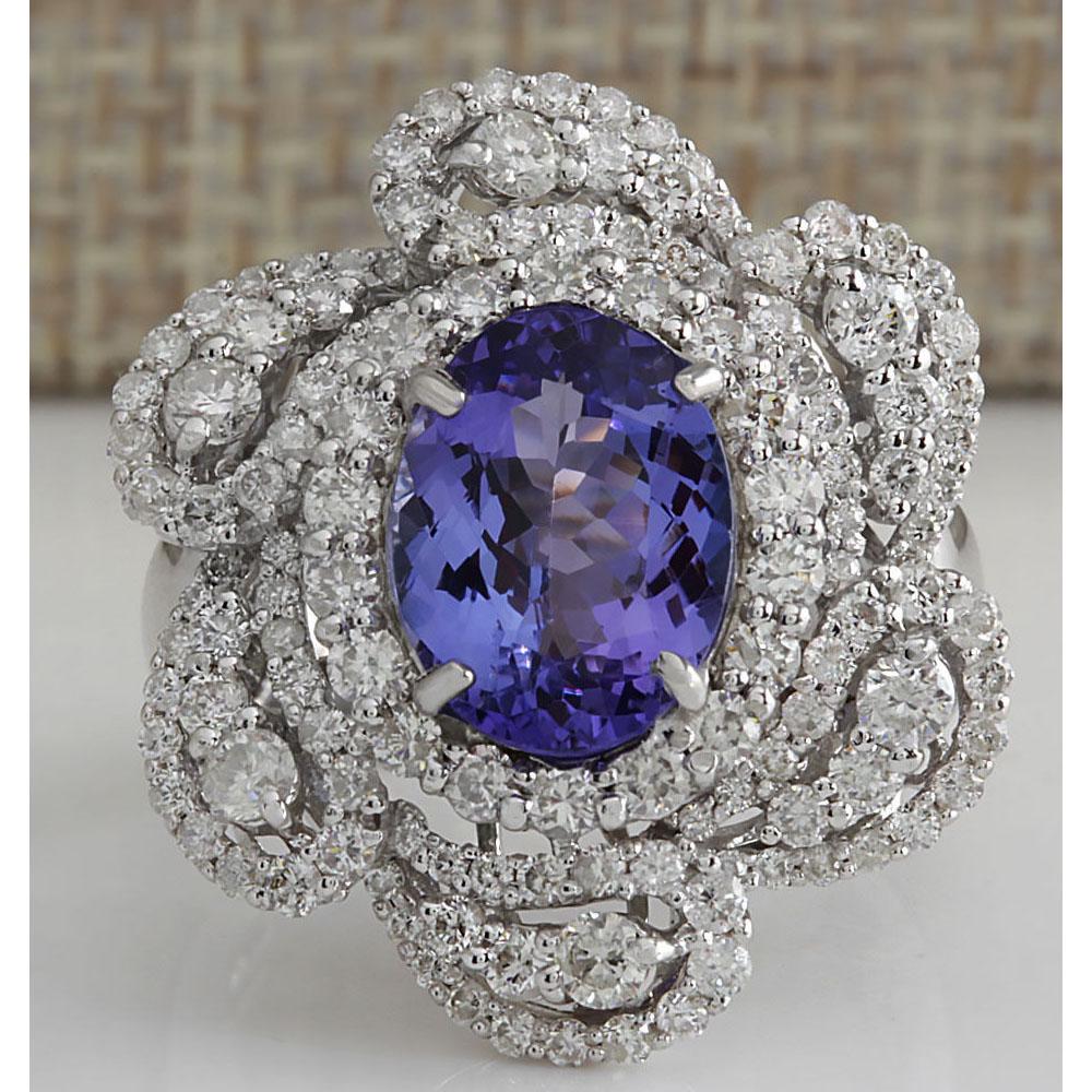 4.97 CTW Natural Tanzanite And Diamond Ring 14K Solid White Gold: 4.97 CTW Natural Tanzanite And Diamond Ring 14K Solid White Gold Manufacturer's Suggested Retail Price: $ 6500.00 Stamped: 14K Ring Size: 6.75 Total Ring Weight: 11 Grams Diamond Weight: Total Natural