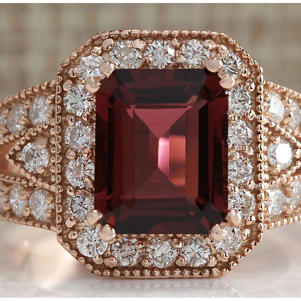 3.89 CTW Natural Pink Tourmaline And Diamond Ring 18K Solid Rose Gold: 3.89 CTW Natural Pink Tourmaline And Diamond Ring 18K Solid Rose Gold Manufacturer's Suggested Retail Price: $ 4600.00 Stamped: 18K Ring Size: 6.5 Total Ring Weight: 7.6 Grams Diamond Weight: Total Na
