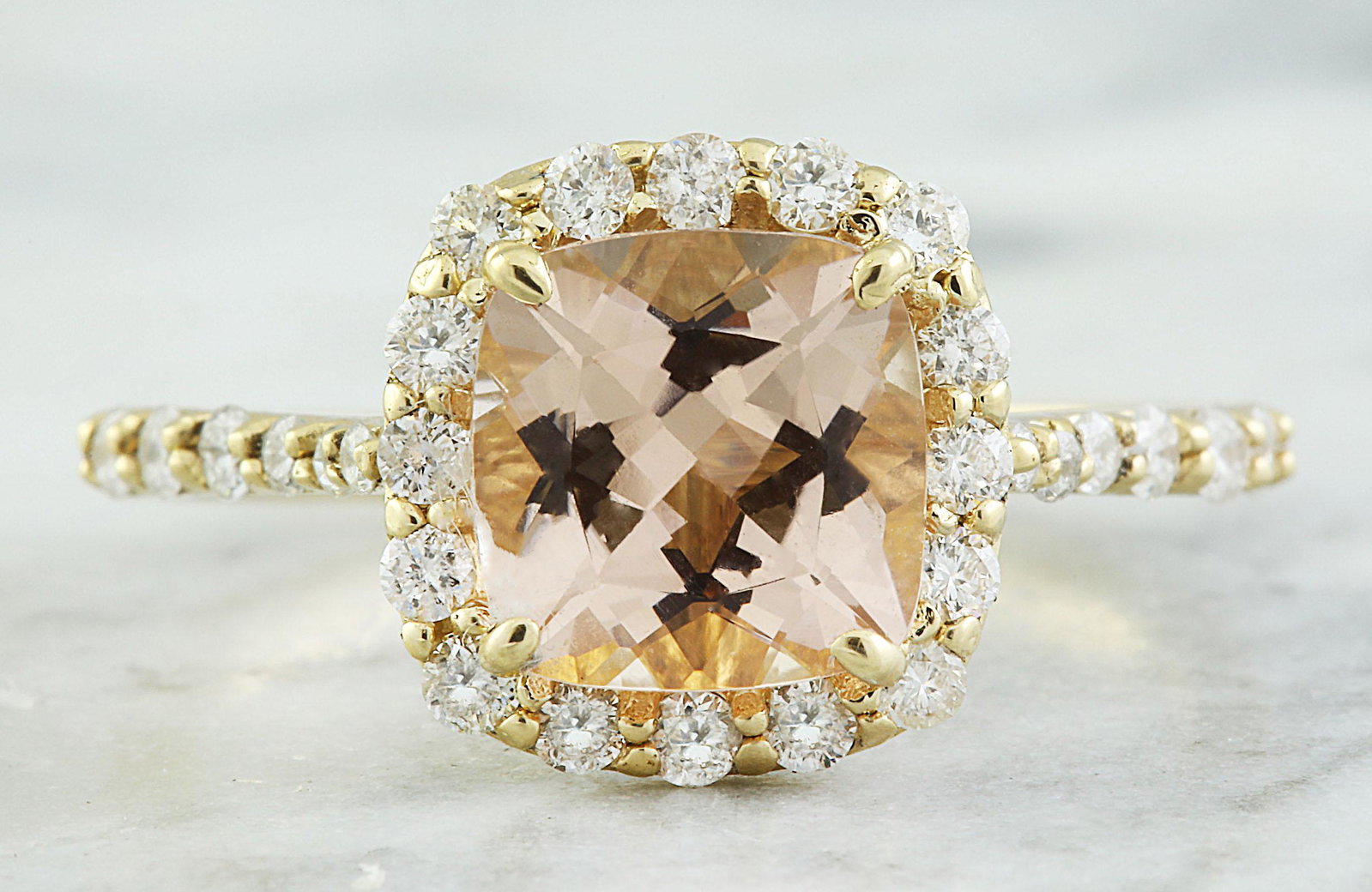 2.32 CTW Morganite 18K Yellow Gold Diamond Ring: 2.32 CTW Morganite 18K Yellow Gold Diamond Ring Manufacturer's Suggested Retail Price: $ 2800.00 Stamped: 18K Total Ring Weight: 3 Grams Morganite Weight: 1.82 Carat (7.60x7.50 Millimeters) Diamond We