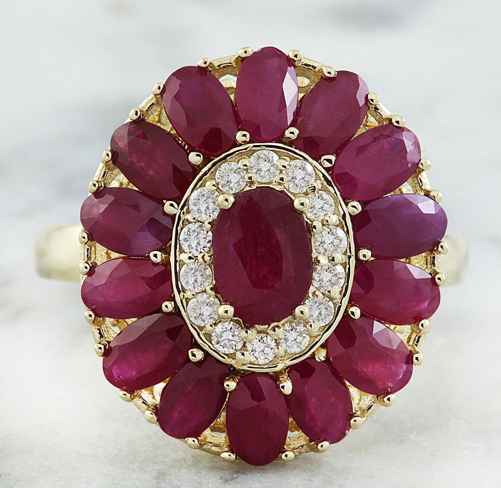 4.40 CTW Ruby 18K Yellow Gold Diamond Ring: 4.40 CTW Ruby 18K Yellow Gold Diamond Ring Manufacturer's Suggested Retail Price: $ 3300.00 Stamped: 18K Total Ring Weight: 6.3 Grams Ruby Weight 4.05 Carat (6.50x4.80 Millimeters) Diamond Weight: 0.3