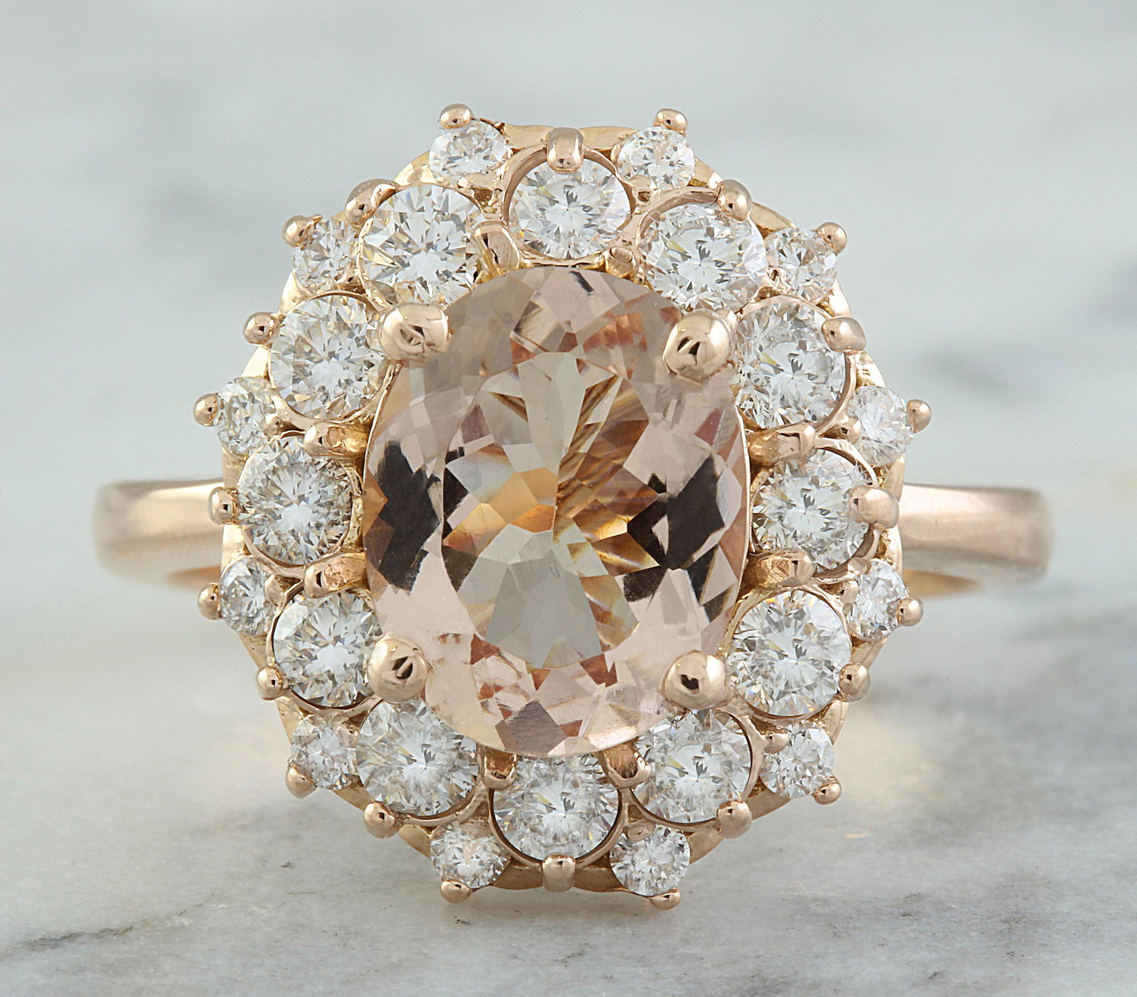 3.90 CTW Morganite 14K Rose Gold Diamond Ring: 3.90 CTW Morganite 14K Rose Gold Diamond Ring Manufacturer's Suggested Retail Price: $ 3800.00 Stamped: 14K Ring Size: 7 Total Ring Weight: 6.2 Grams Morganite Weight: 2.80 Carat (10.30x8.00 Millimete