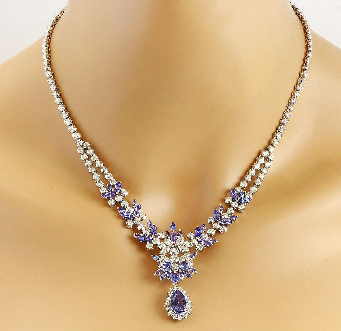 18.86 CTW Natural Tanzanite 18K Solid White Gold Diamond Necklace: 18.86 CTW Natural Tanzanite 18K Solid White Gold Diamond Necklace Manufacturer's Suggested Retail Price: $ 23000.00 18.86 Carat Natural Tanzanite 18K Solid White Gold Diamond Necklace Item Type: Neckl