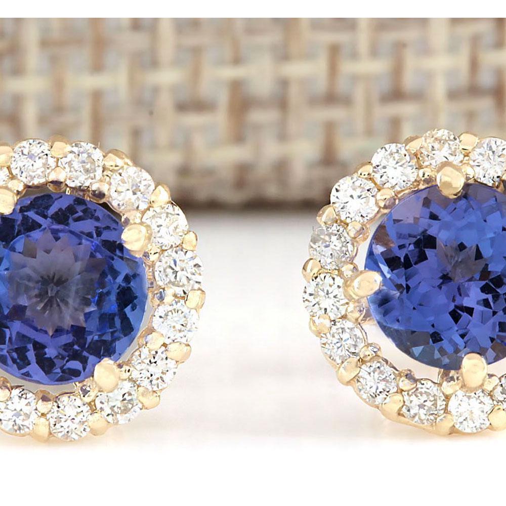 2.65 CTW Natural Blue Tanzanite And Diamond Earrings 14k Solid Yellow Gold: 2.65 CTW Natural Blue Tanzanite And Diamond Earrings 14k Solid Yellow Gold Manufacturer's Suggested Retail Price: $ 3200.00 Stamped: 14K Total Earring Weight: 2.00Grams Diamond Weight: Total Natural d