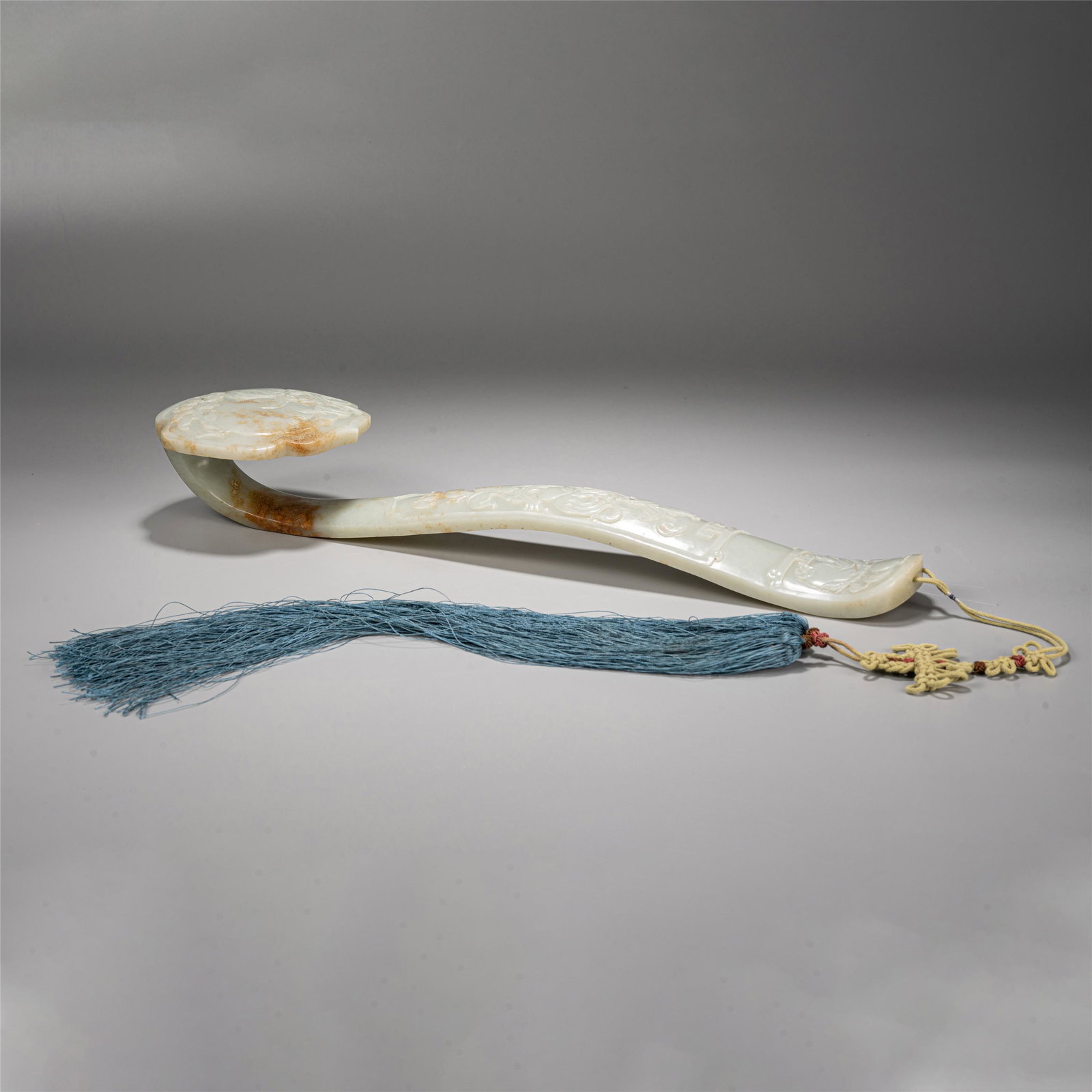 CHINESE WHITE JADE CARVED RUYI SCEPTER TABLE ITEM: Dimensions: 42 cm L PROVENANCE: From The Estate of Jerry Parsons (1937-Oct 2018) Wilmington, DE. Gerald retired from the U.S. Department of Commerce as an international consultant. During his time in 