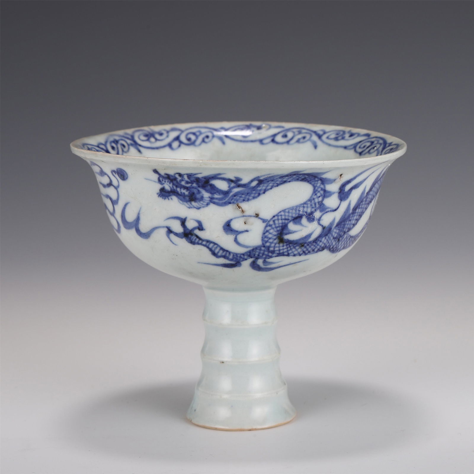 A CHINESE BLUE AND WHITE PORCELAIN STEM CUP (1 of 9)