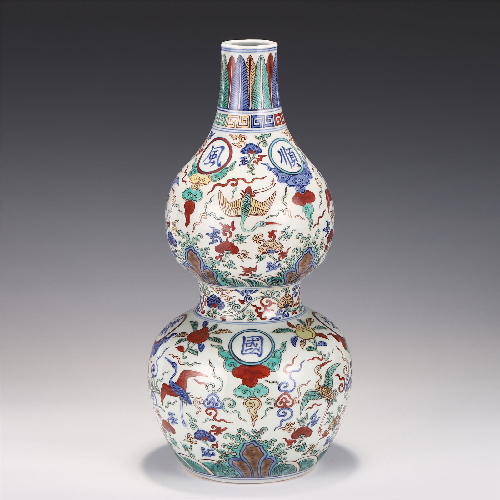 A CHINESE BLUE AND WHITE WU CAI PORCELAIN DOUBLE-GOURD (1 of 9)