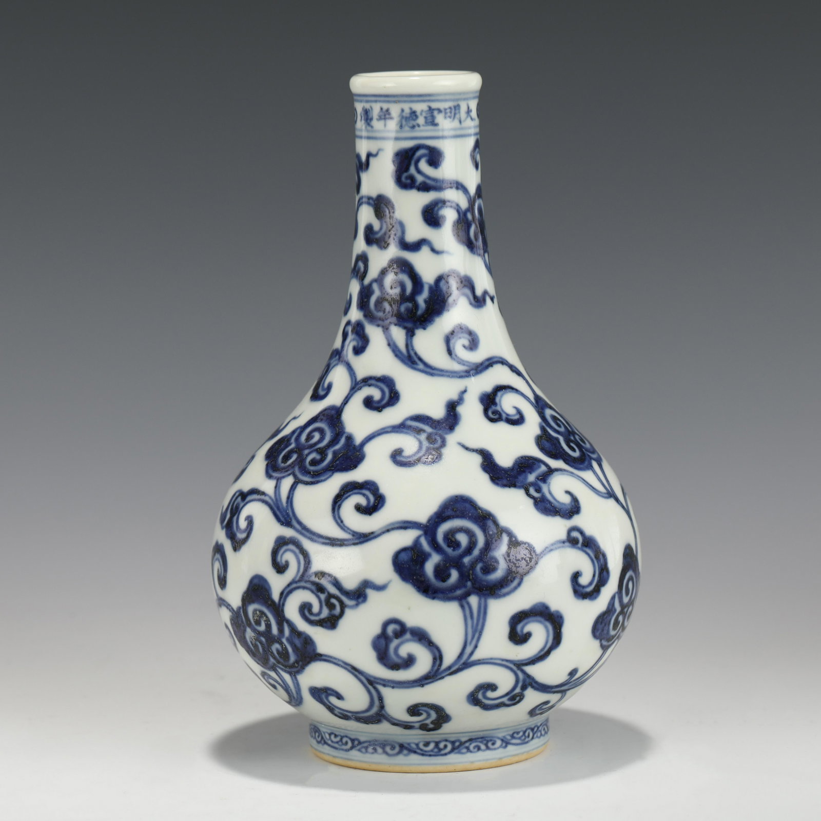 XUANDE BLUE & WHITE MORNING GLORY VASE: Dimensions (cm): Heigth: 18?Diam.: 11 Chinese Ming Dynasty XuanDe Blue and White Morning Glory Porcelain Vase. Potted in reward shape vase, thick and tall, globular lower body, straight cylindrical ne