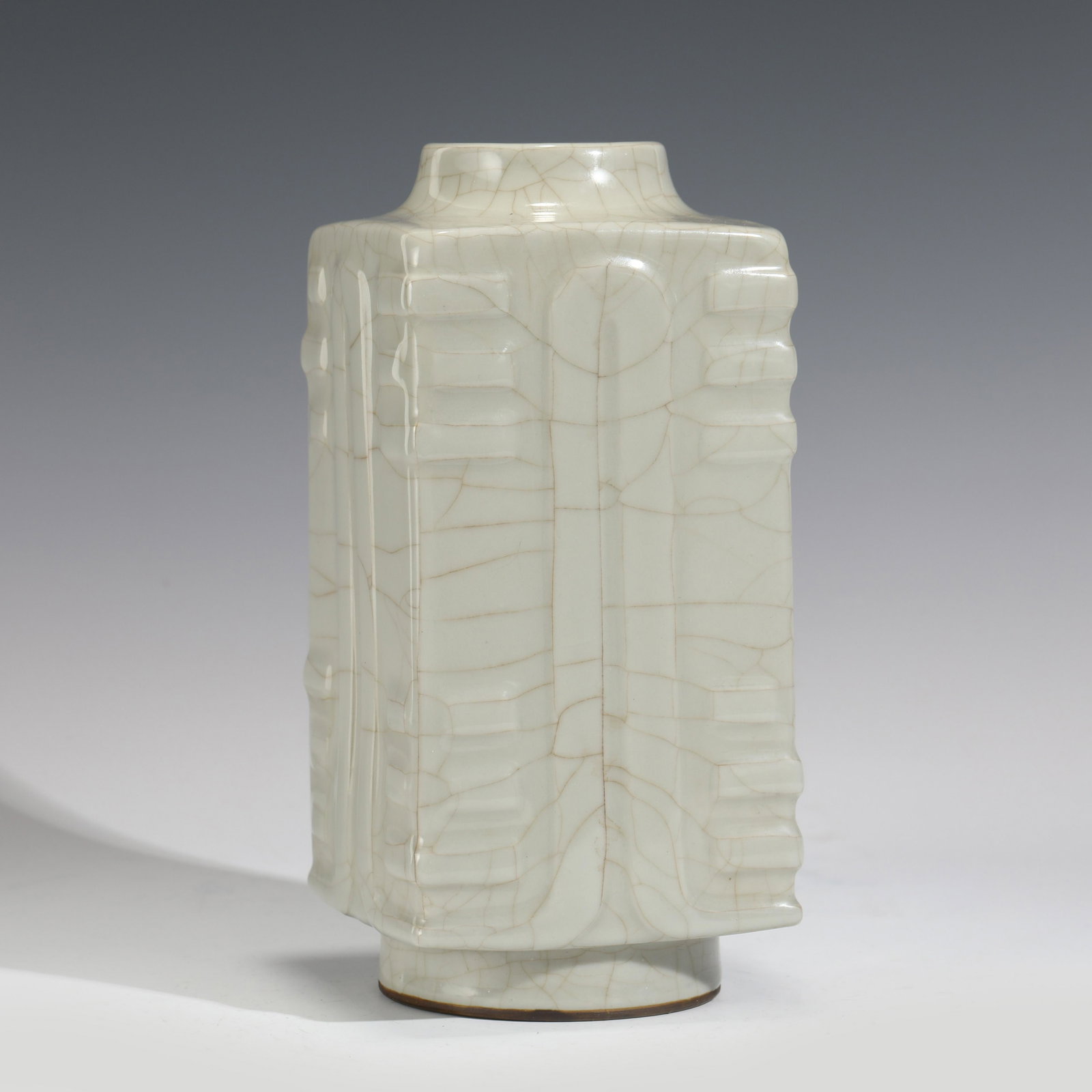 QIANLONG CHINESE ZONG BOTTLE VASE: Dimensions (cm): Heigth: 25.5 Diam.: 16 Chinese Qing Dynasty QianLong Ge Klin Glazed Motif Porcelain Zong Vase. The Porcelain potted in Zong shape vase, thick and tall, squared body, with short circle