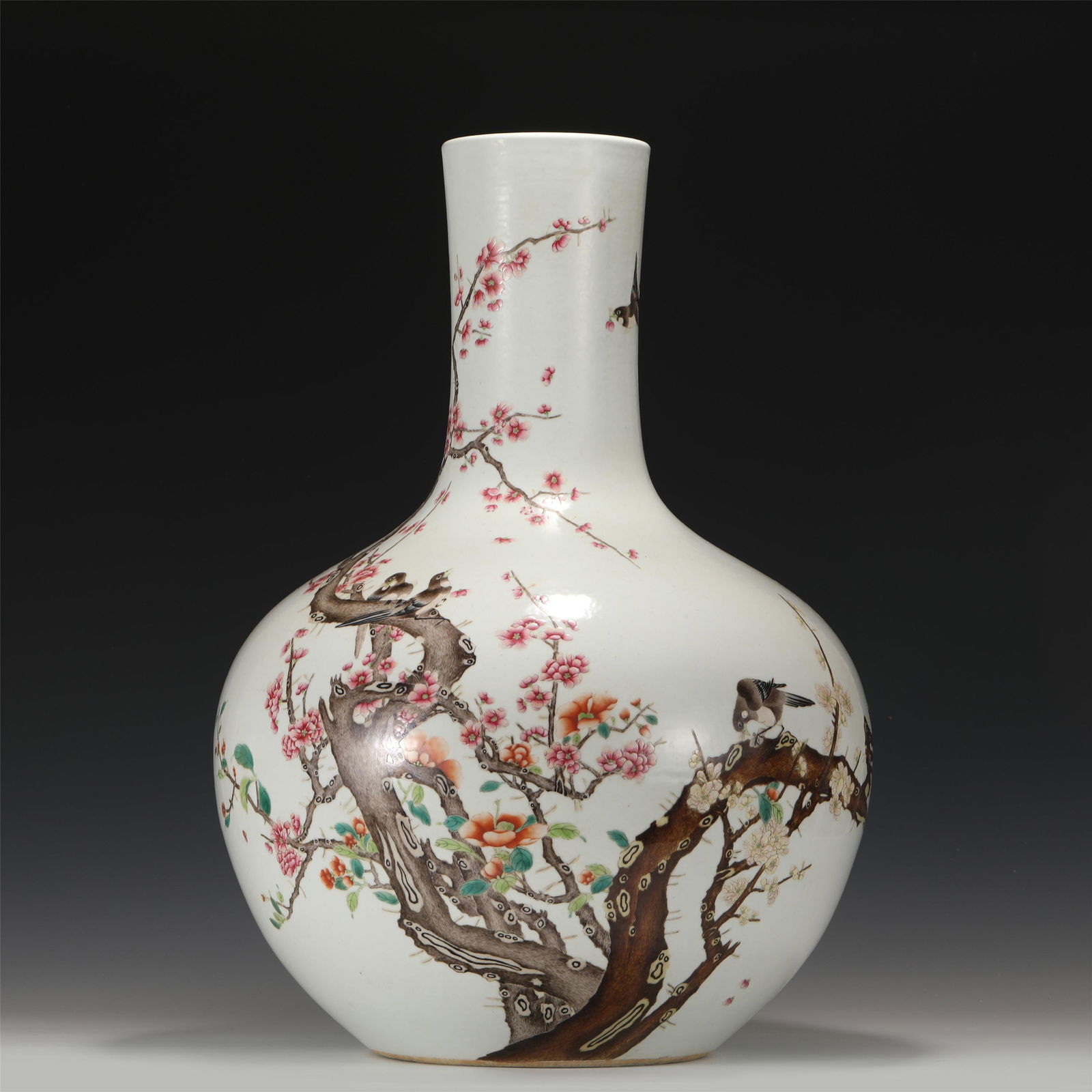 A CHINESE FAMILLE ROSE MAGPIE ASCENDS PLUM PORCELAIN VASE (1 of 13)
