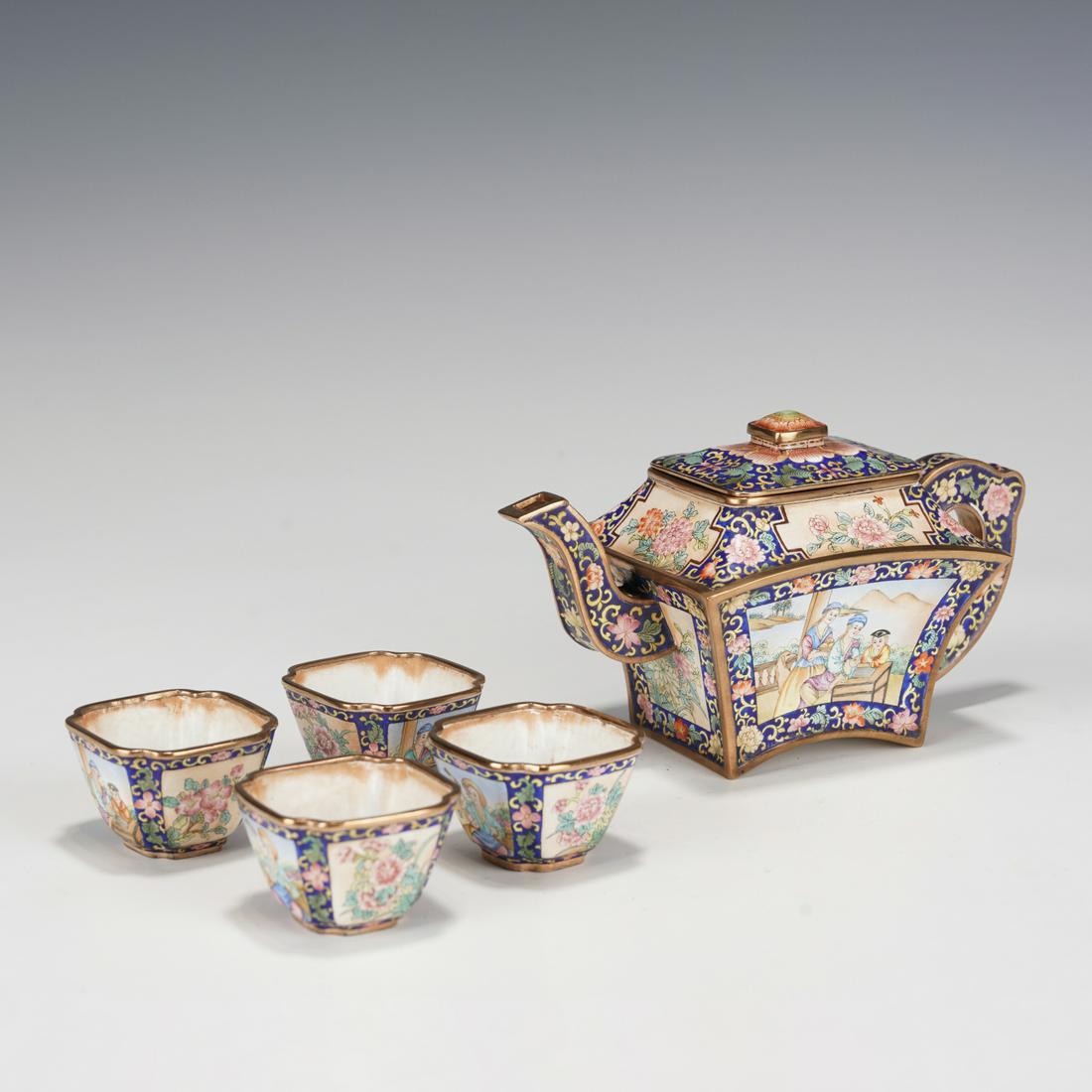 A Group Of Painted Enamel Teapot And Cups