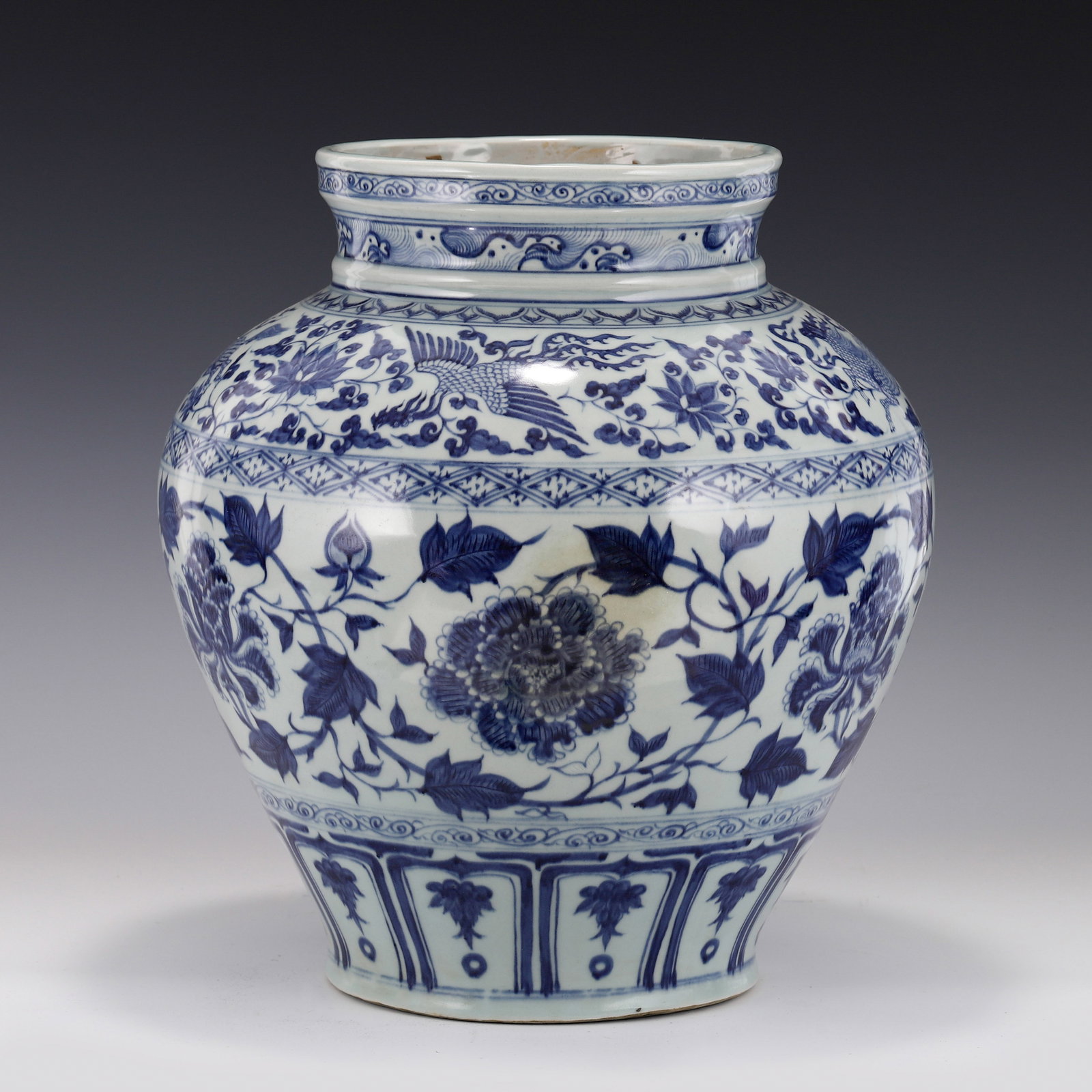 YUAN BLUE & WHITE WRAPPED FLORAL JAR: Dimensions: Height: 38cm, Diam: 35cm Chinese Yuan Dynasty Period, Blue and white Floral porcelain jar pot. This porcelain has an open round mouth lip, with slight flaring rim, short neck, globular bod