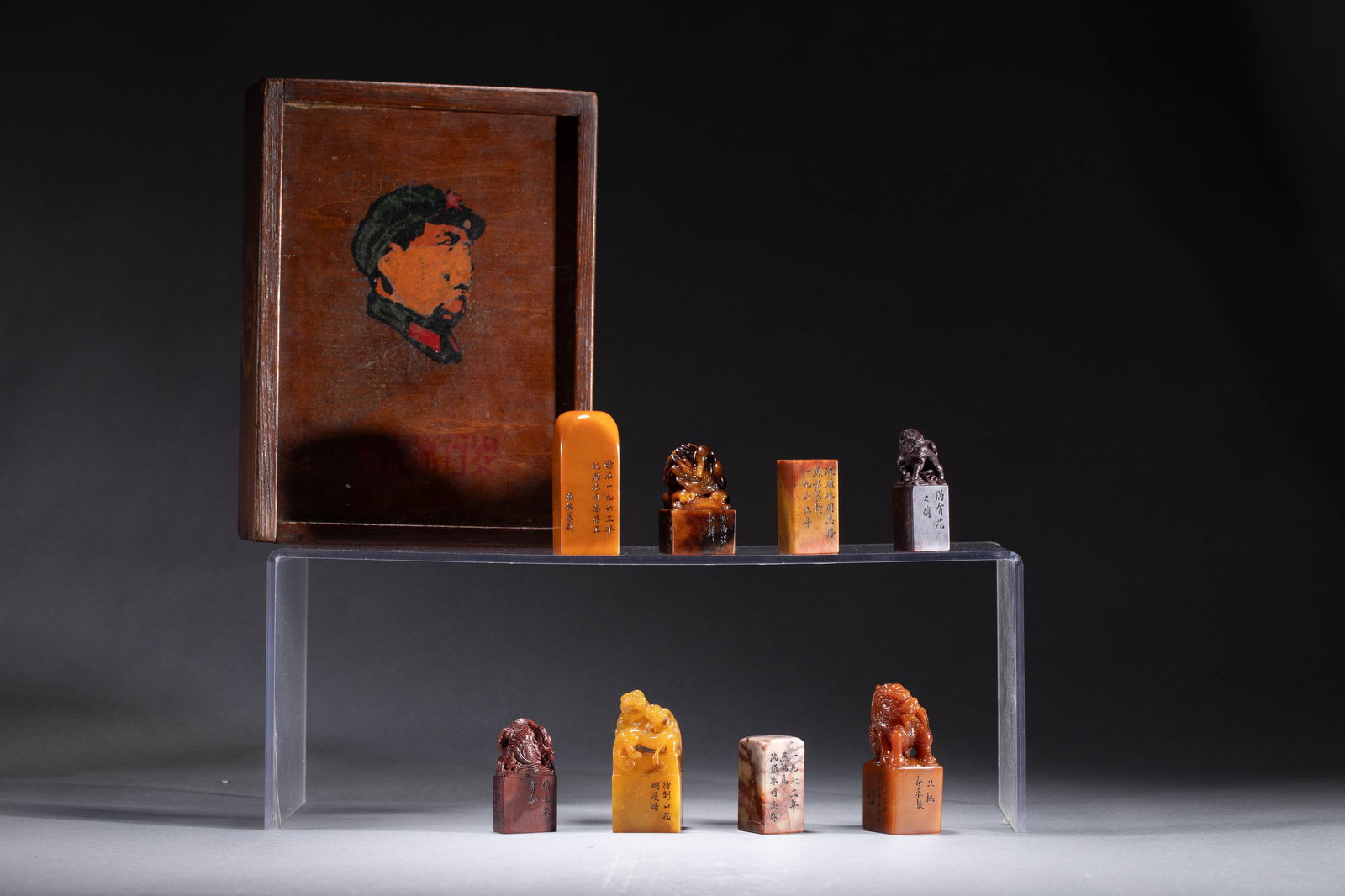 A GROUP OF EIGHT SEALS: Dimensions: Length: 3.3 cm, Width: 3.3 cm, Height: 7.5 cm, Weight 192 gram. A collection of eight pieces, each of rich amber tone, inscribed at the sides, comprising with wooden box.