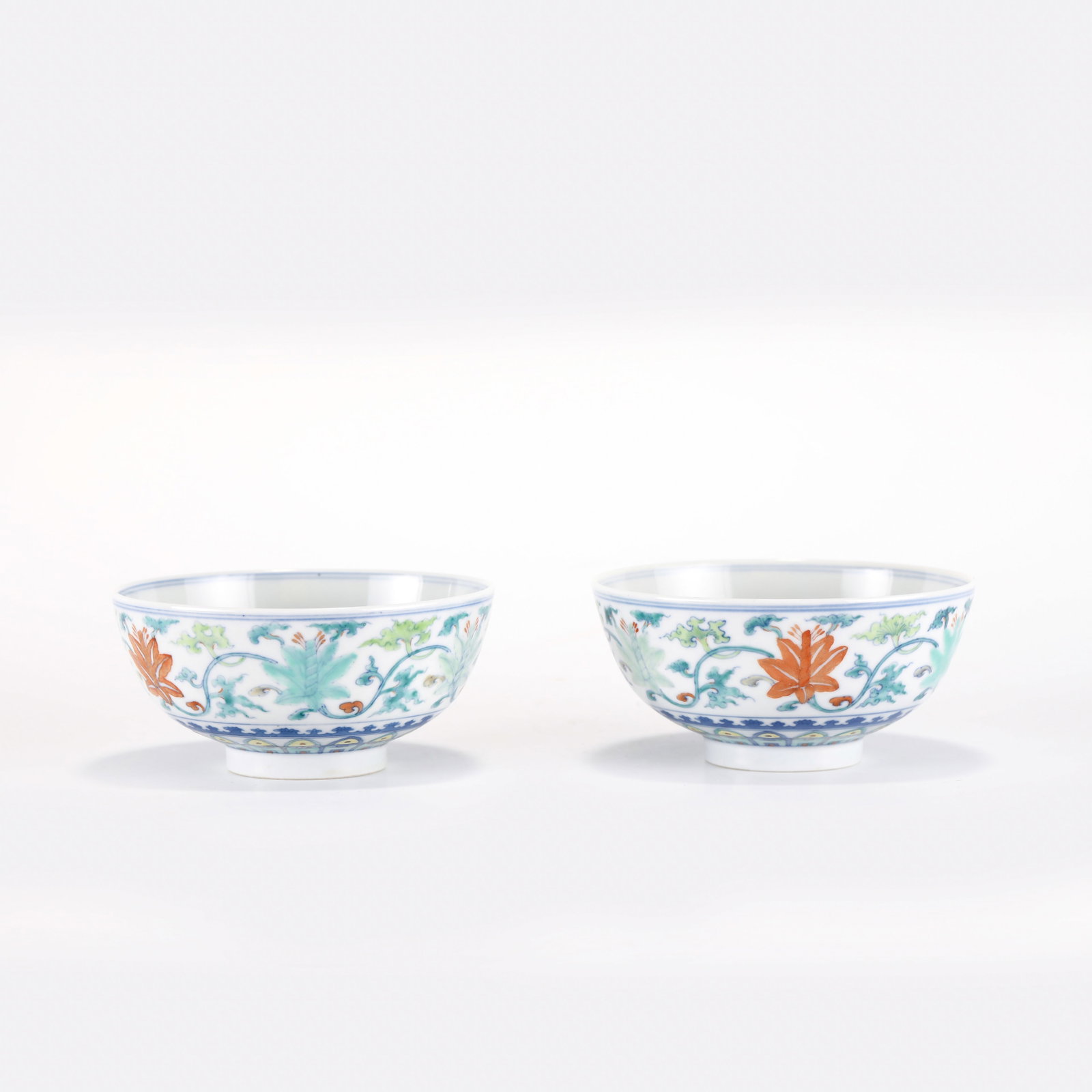 YONGZHENG DOUCAI BOWL: PROVENANCE: From waldorf, MD Private Collector. Dimensons: Height: 5.5 cm, Diam: 11.9 cm Pair of Chinese Qing Dynasty YongZheng Famille Rose Flowers Porcelain Bowls. The porcelain potted with a shallo