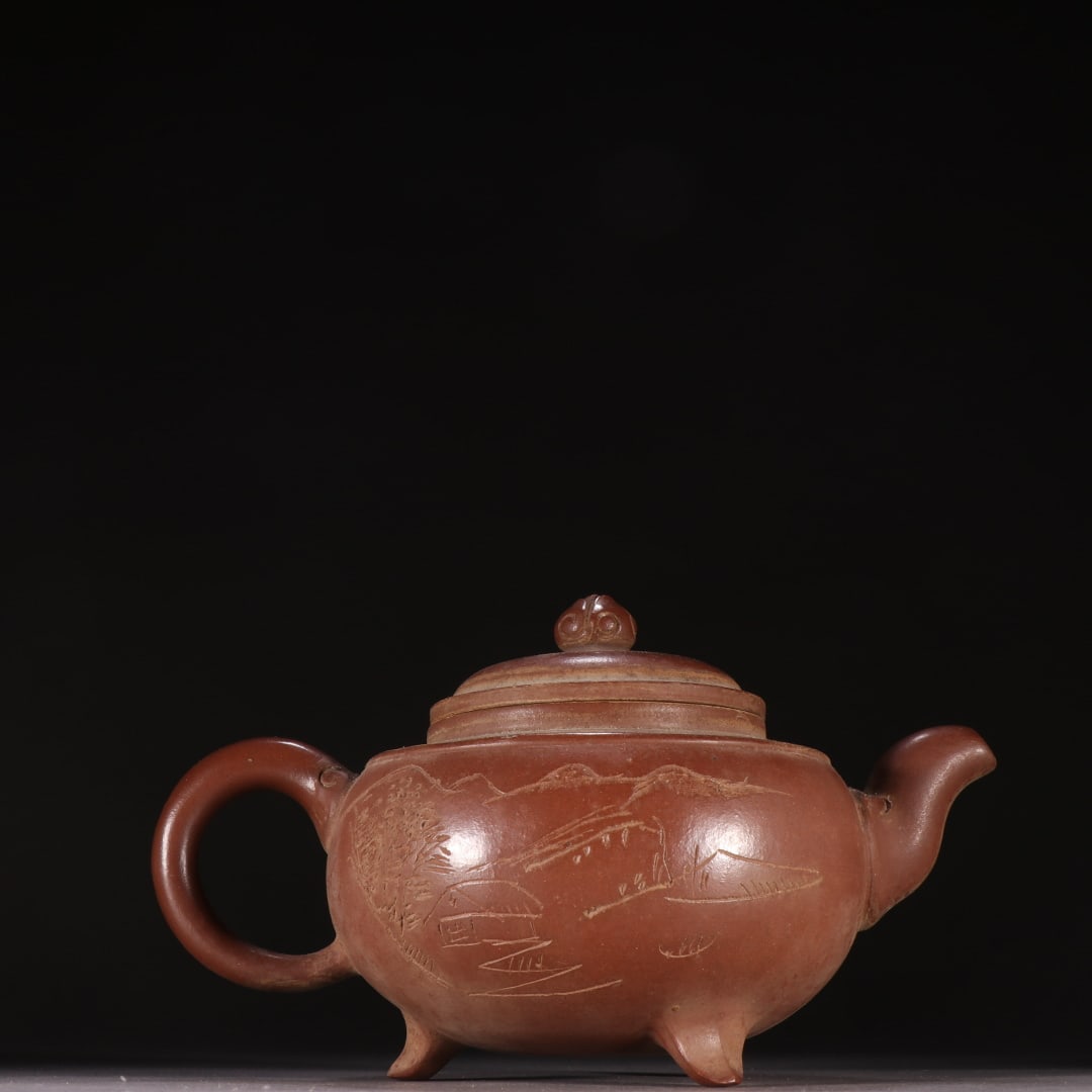 A CHINESE ZISHA TEAPOT WITH LANDSCAPE CARVING (1 of 9)