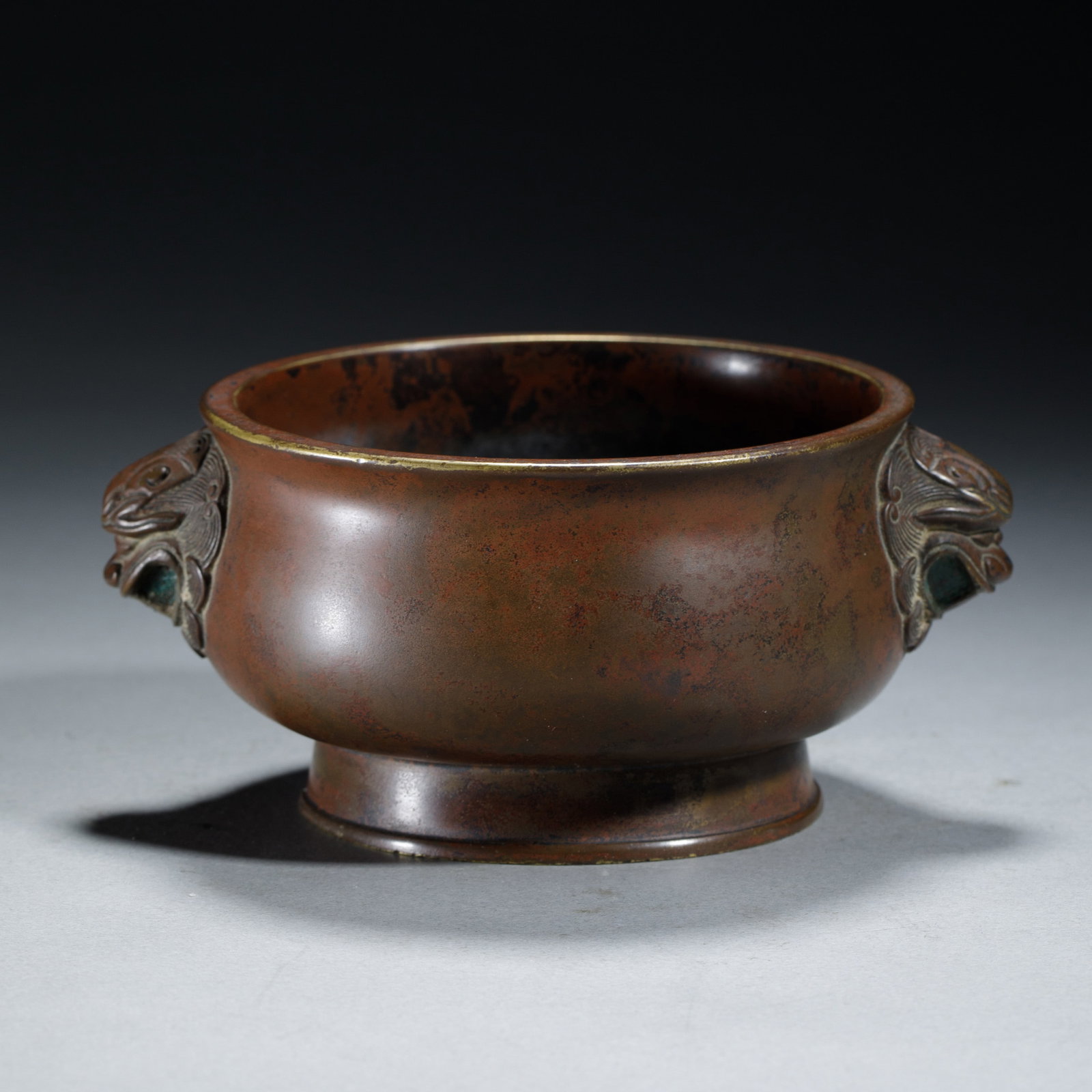 A CHINESE BRONZE CENSER WITH BEAST HANDLES (1 of 9)