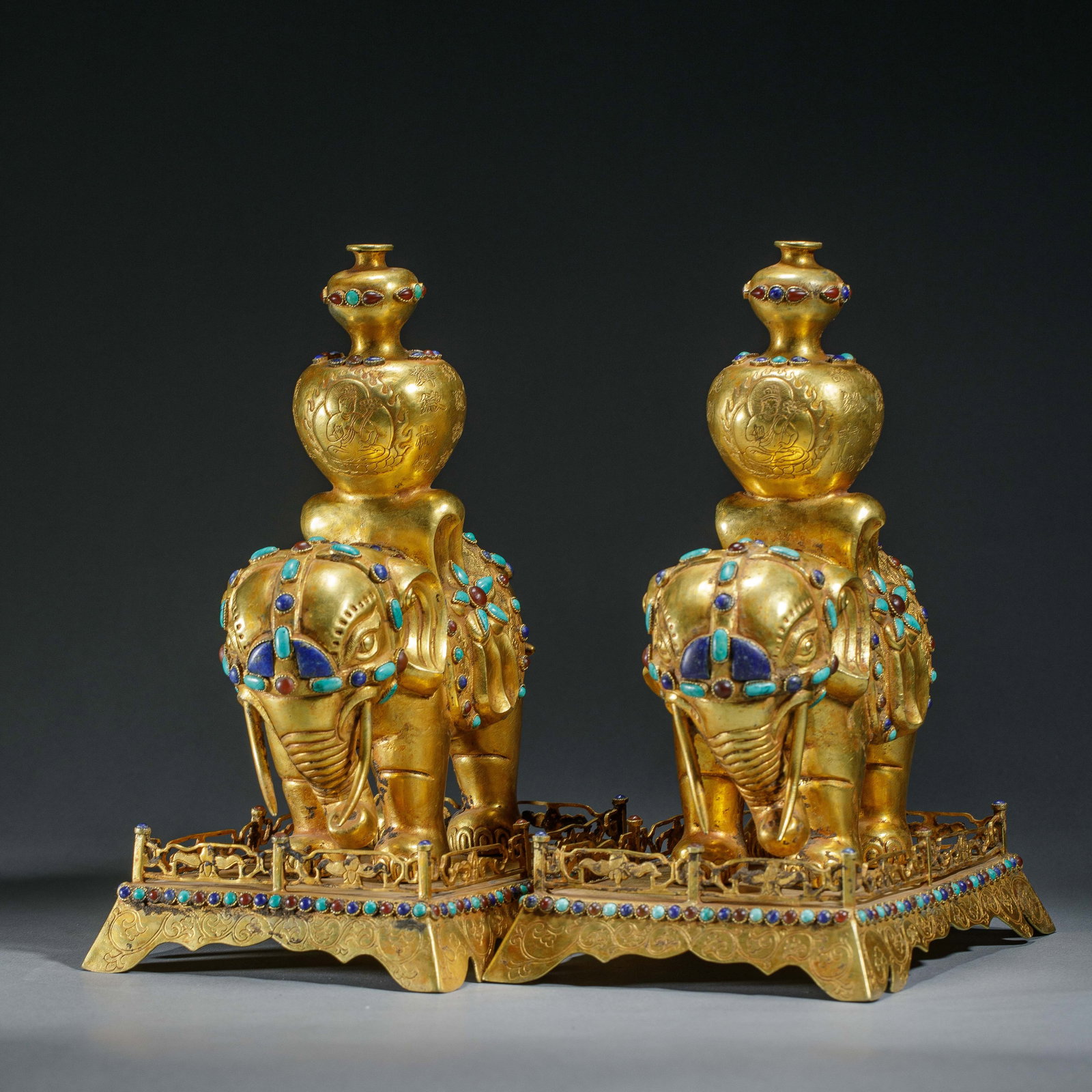 A PAIR OF CHINESE GILDED ELEPHANT CAPARISONED VASES (1 of 9)
