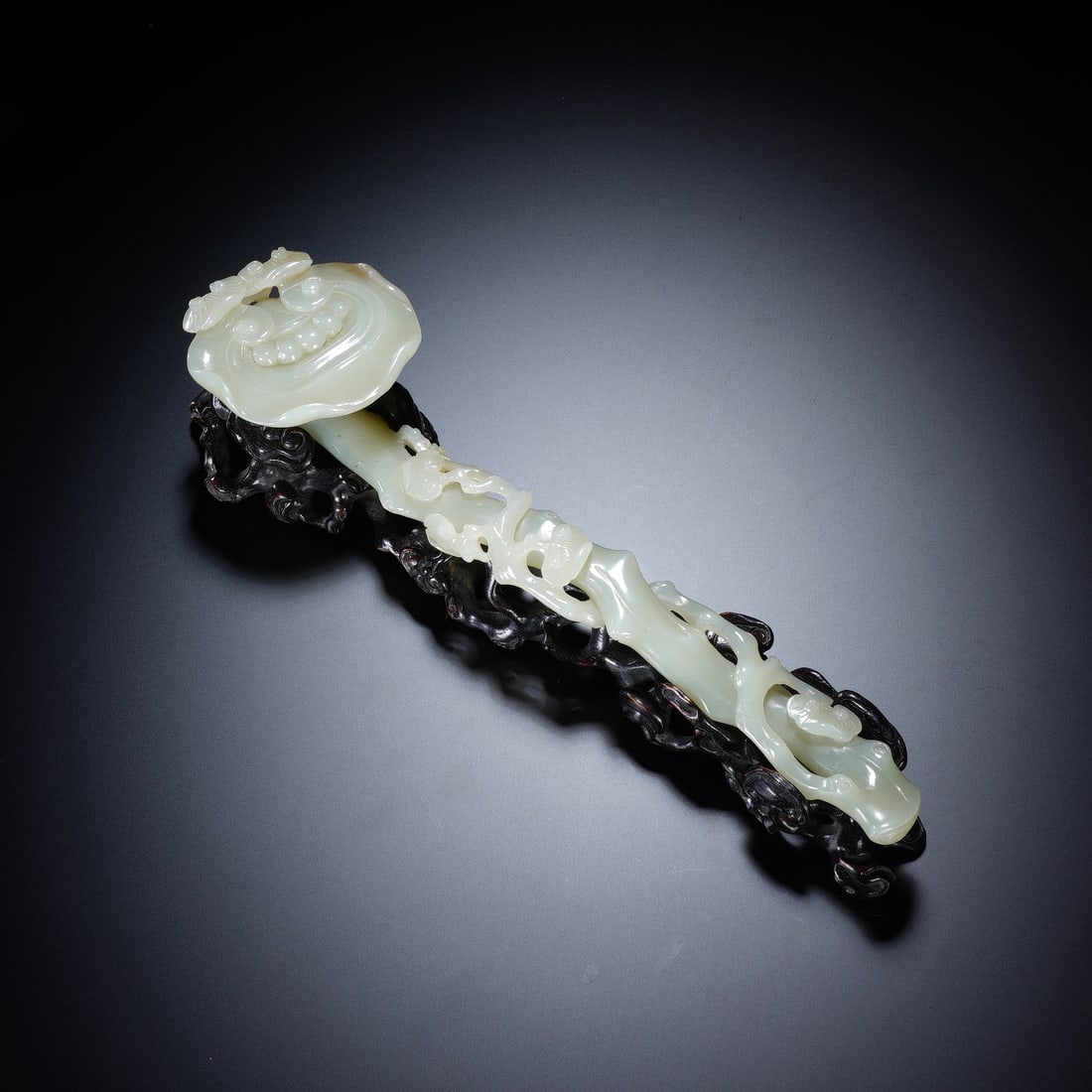 A CHINESE BAMBOO-FORM JADE RUYI SCEPTER (1 of 8)