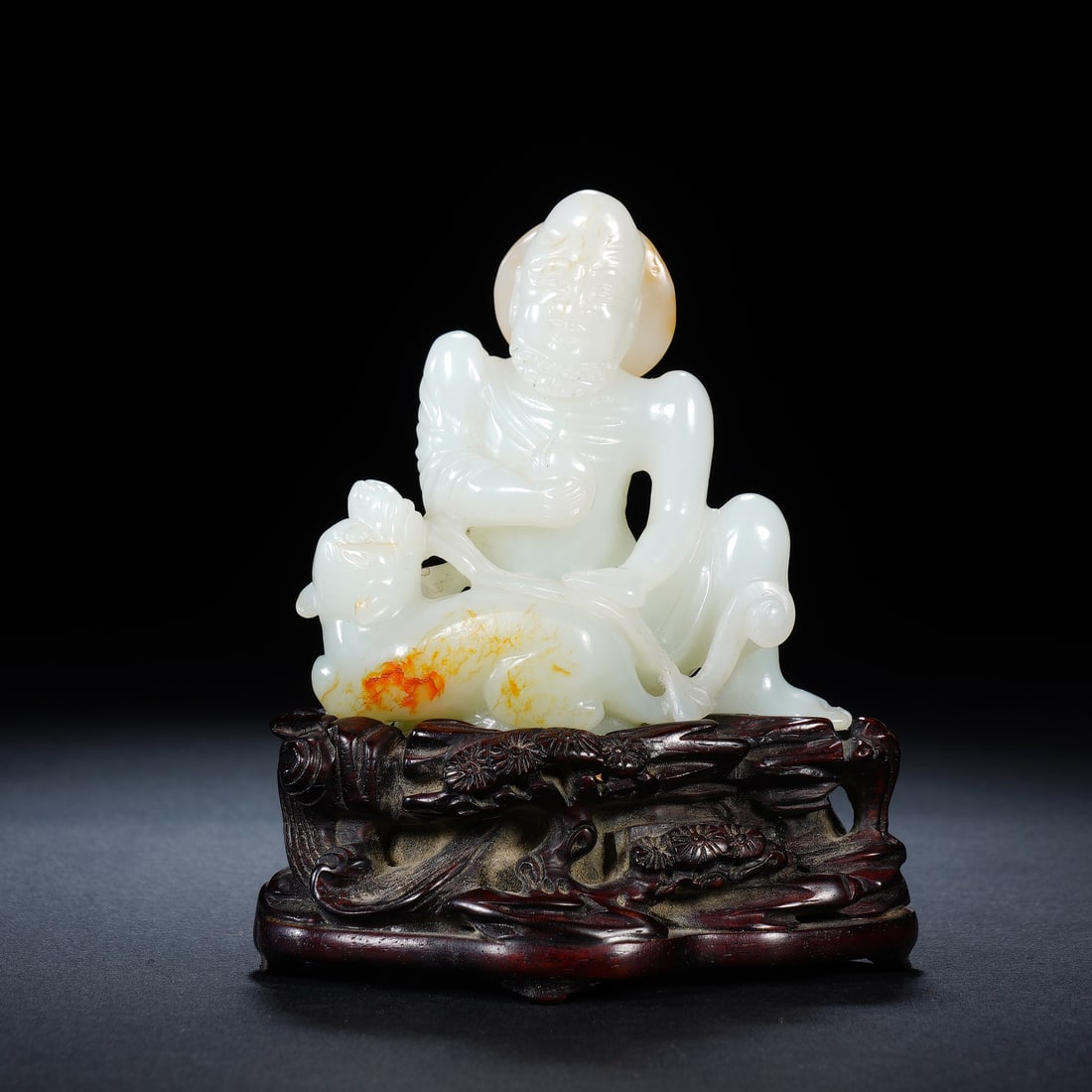 A CHINESE WHITE JADE LUOHAN FIGURE (1 of 8)