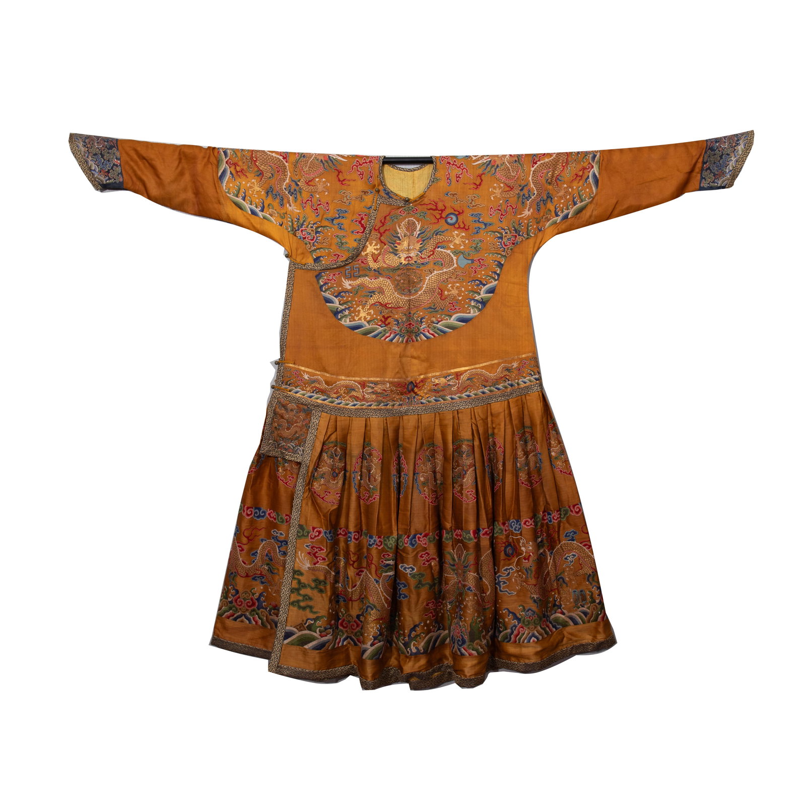 A CHINESE APRICOT-GROUND BROCADE DRAGON COURT ROBE (1 of 17)