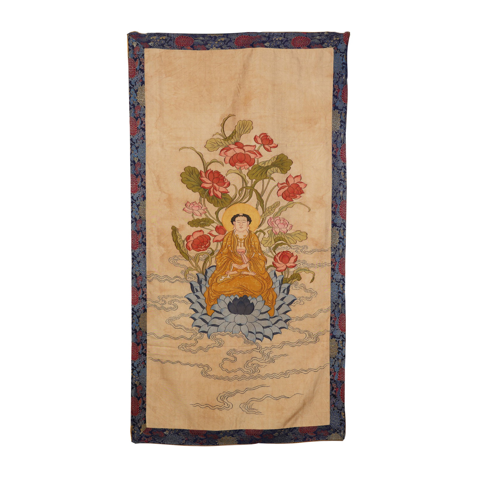A CHINESE KESI BUDDHA AMITABHA HANGING SCROLL: Dimensions:76x154 cm. A magnificent Qing-dynasty kesi (silk tapestry) hanging scroll depicting Buddha Amitabha (Wuliang Shou Fo) seated in dhyanasana upon a large, layered blue lotus throne. The Buddh