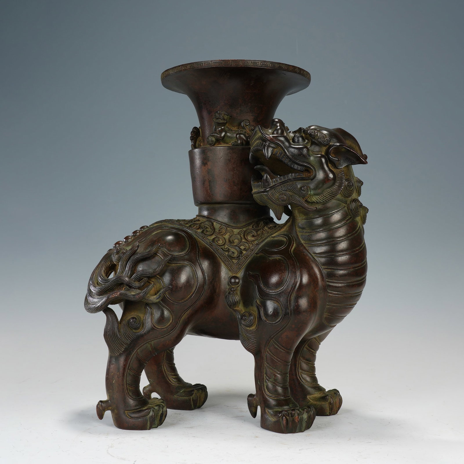 A CHINESE BRONZE LION-FORM VASE (1 of 9)