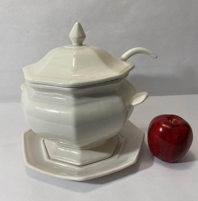 Ironstone Soup Tureen: Ironstone soup tureen with lid, plate and spoon. Unmarked. 9" x 10".