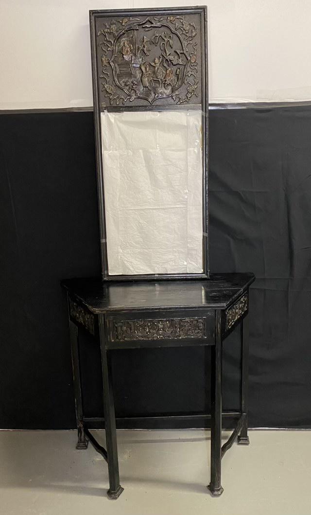 Antique Asian Table and Mirror: Antique Asian table and mirror with raised pictoral decor. Table is 32" wide x 13.75"deep, Mirror is 41" x 17.5" overall