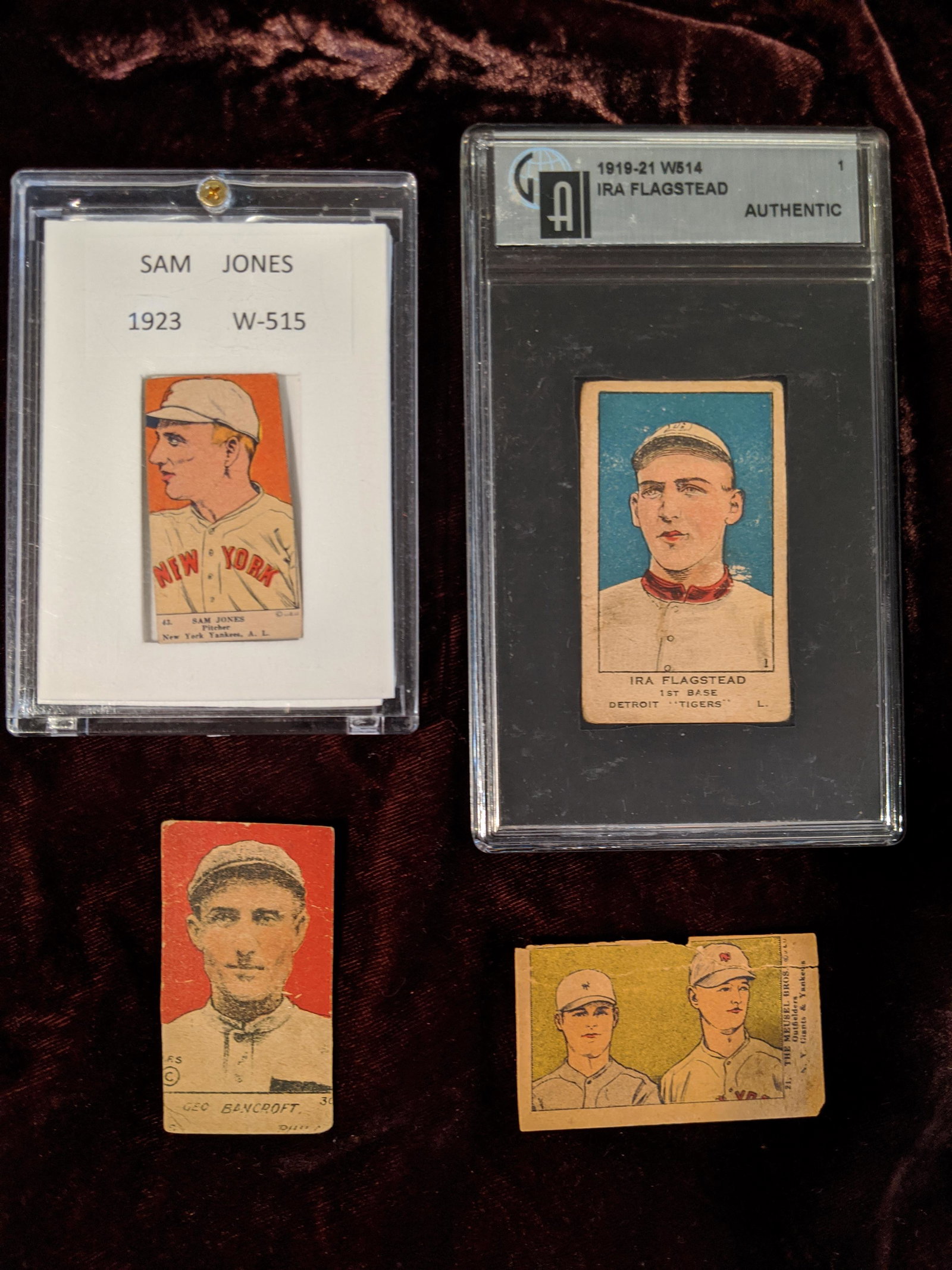 1919-23 W514-516 baseball card lot: A 1919-21 W514 Ira Flagstead rated Authentic by Global Authentication Inc., a 1921 W516 George Bancroft, a 1923 W515 Sam Jones and a 1923 W515 #21 Meusel Bros card. See photos for condition of cards.