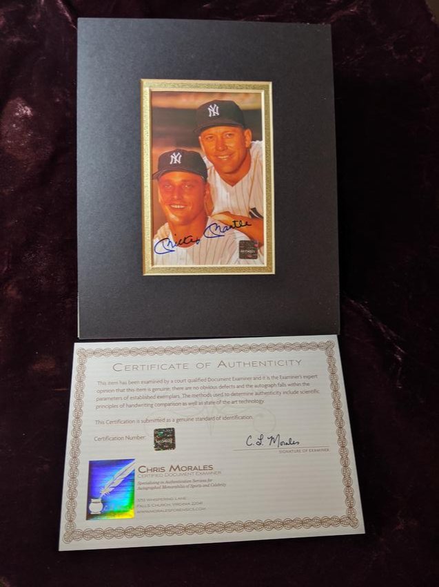 Mickey Mantle autographed photo with Roger Maris: A Mickey Mantle autographed photo with Roger Maris authenticated by Chris Morales. See photos for condition.