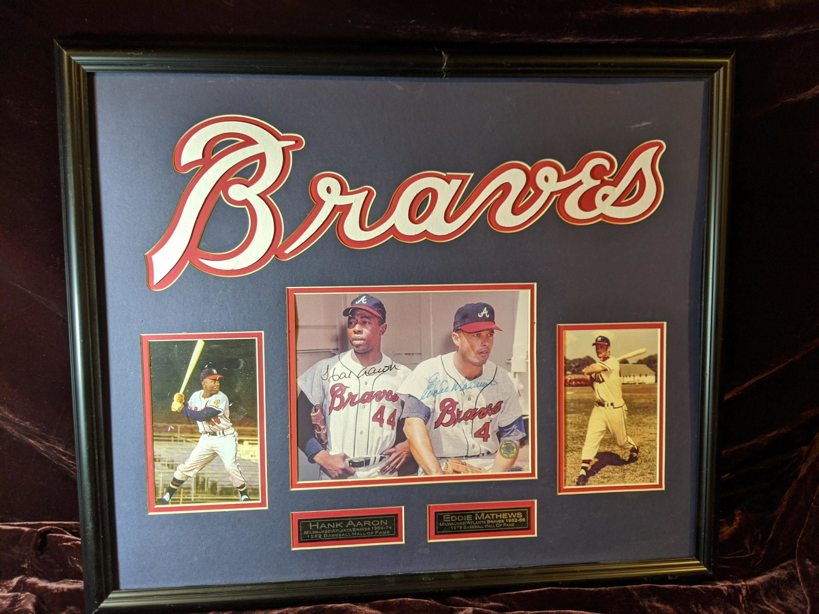 Hank Aaron and Eddie Mathews Braves autographed photo: Hank Aaron and Eddie Mathews autographed Braves photo authenticated by Guaranteed Forensic Authenticators. No glass in frame, damage to frame. See photos for condition.