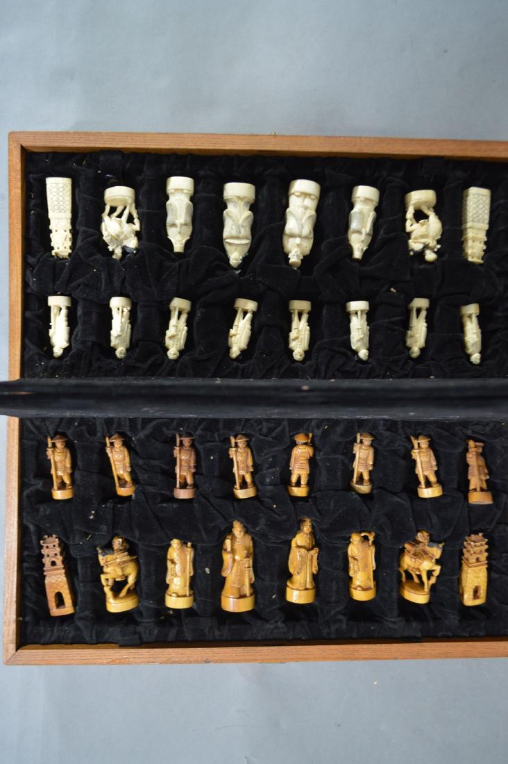 ANTIQUE CARVED AND SIGNED CHESS SET. 15" x 15" (1 of 6)