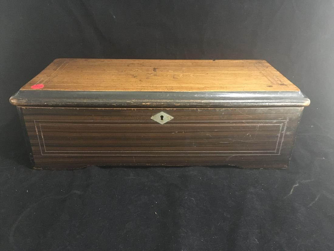 10 SONG ANTIQUE SWISS CYLINDER MUSIC BOX. FLORAL INLAY: 10 SONG ANTIQUE SWISS CYLINDER MUSIC BOX. FLORAL INLAY ON TOP18.5" X 9.5"X 6.5"