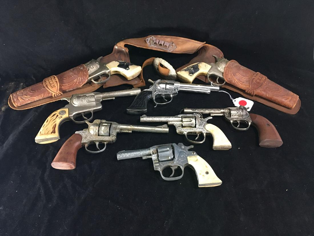 LOT OF NINE WESTERN STYLE VINTAGE CAP GUNS: LOT OF NINE WESTERN STYLE VINTAGE CAP GUNS