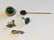 14K GOLD STICKPIN AND 3 SINGLE 14K EARRINGS 14.5 GRAMS