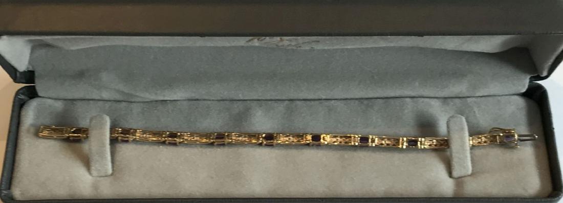 A 14K GOLD AND DIAMOND TENNIS BRACELET 17.46 GRAMS: A 14K GOLD AND DIAMOND TENNIS BRACELET 17.46 GRAMS