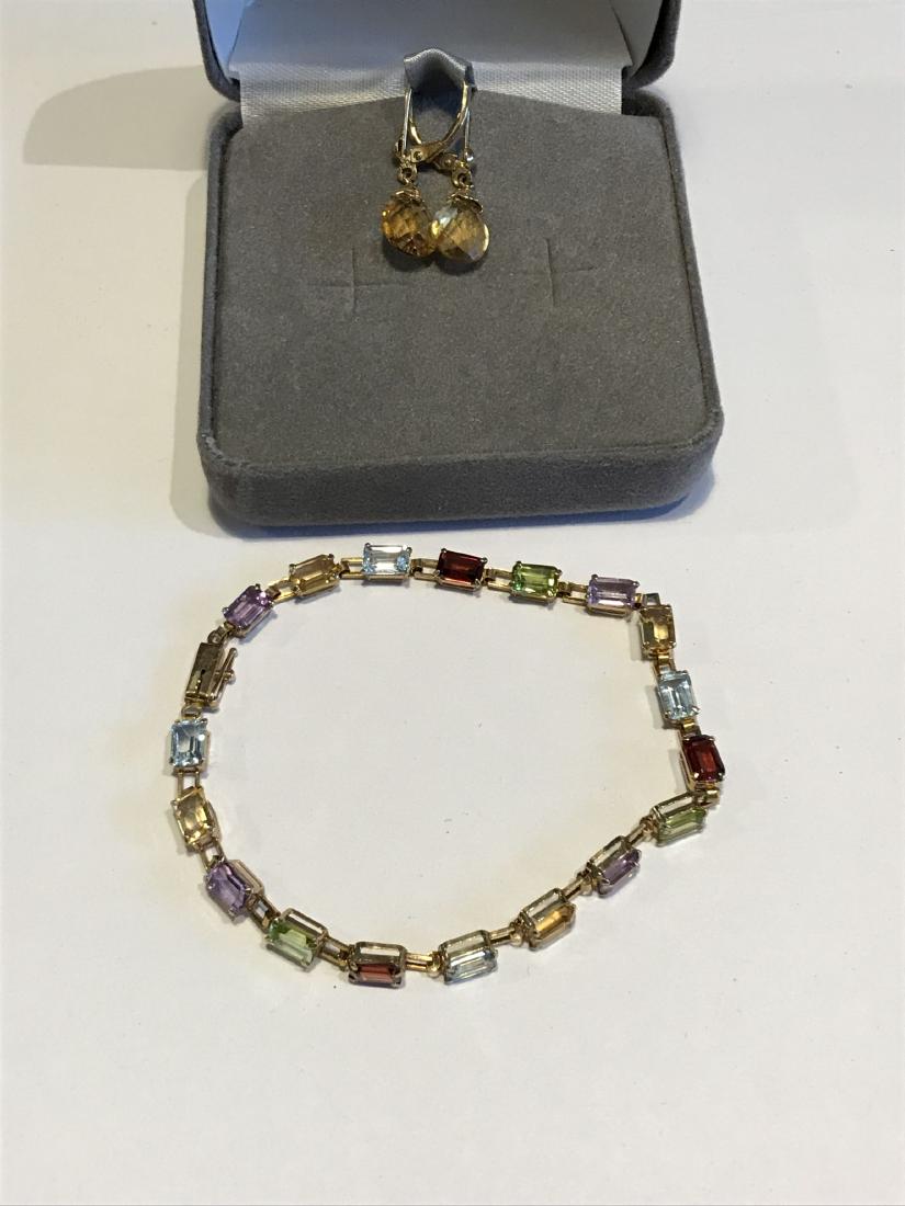 A 14K GOLD BRACELET AND EARRING SET WITH MULTI COLORED: A 14K GOLD BRACELET AND EARRING SET WITH MULTI COLORED STONES 6.75 GRAMS, 8" BRACELET