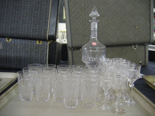 CUT CRYSTAL DECANTER AND 28 PIECES CUT CRYSTAL