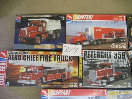 15 UNOPENED TRUCK MODELS; 14 AMT/ERIC, 1 TESTOR - 4