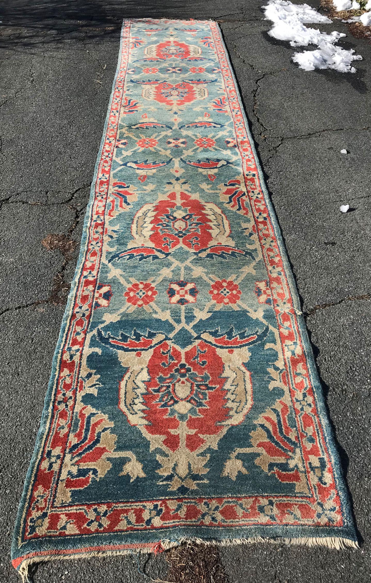 A 20TH CENTURY PERSIAN HALL RUNNER. 14' LONG X 32" WIDE (1 of 6)