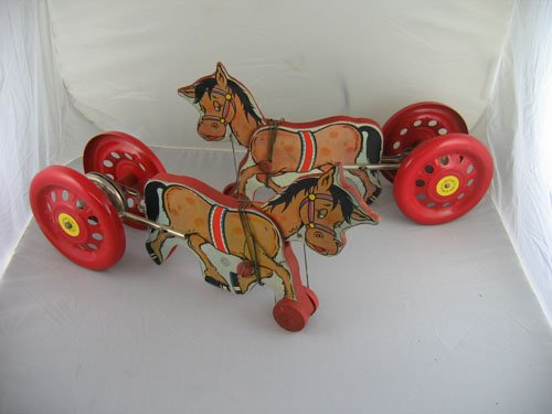PAIR OF 1930S N.N. HILL DONKEY PULL TOYS WITH: PAIR OF 1930S N.N. HILL DONKEY PULL TOYS WITH WOODEN WHEELS AND ORIGINAL PULL STRINGS