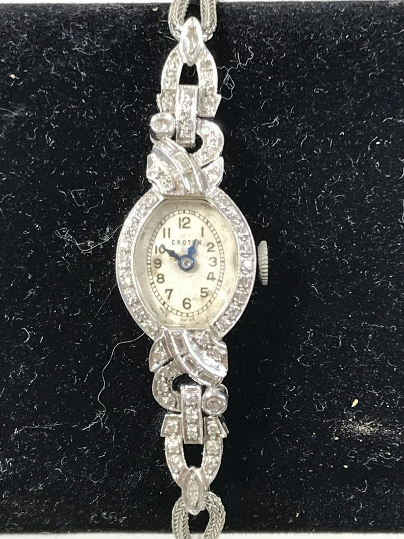 A CROTON PLATINUM AND DIAMOND LADIES WATCH WITH GOLD: A CROTON PLATINUM AND DIAMOND LADIES WATCH WITH GOLD FILLED BAND. PROPERTY FROM A FINE NORTHAMPTON MASS ESTATE