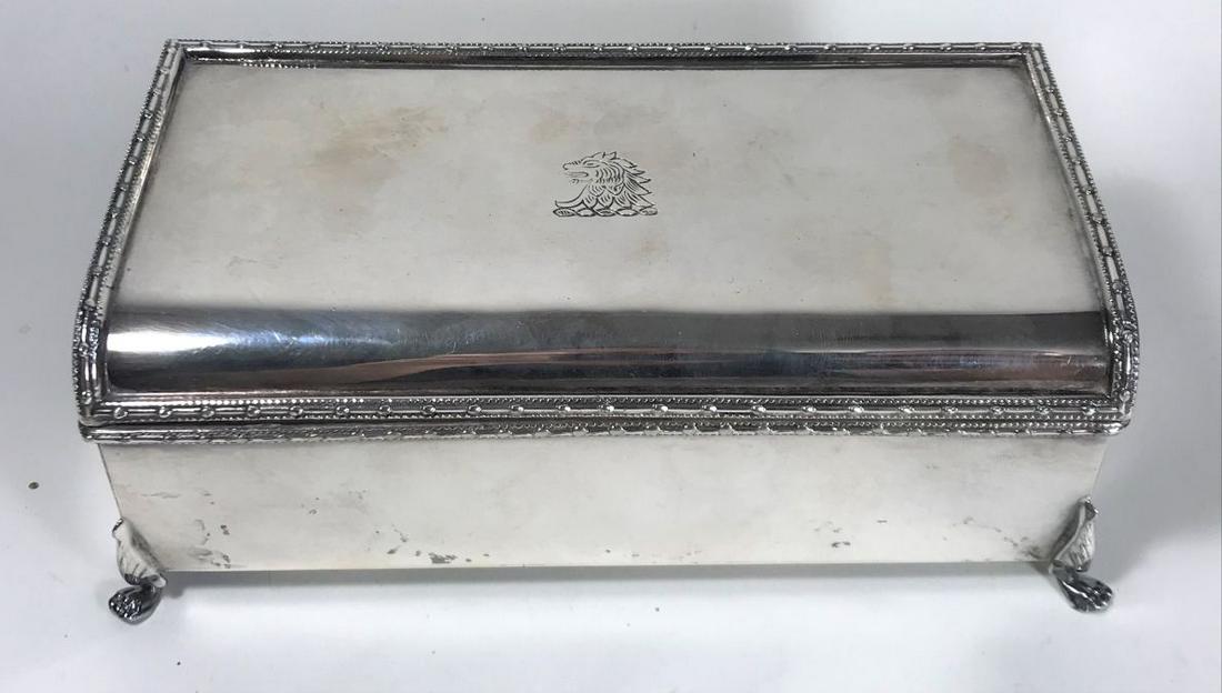A LION CRESTED STERLING SILVER HALLMARKED DRESSER BOX.: A LION CRESTED STERLING SILVER HALLMARKED DRESSER BOX. 7"X 2.5" X 3.5".16.59 TROY OUNCES. PROPERTY FROM A FINE NORTHAMPTON MASS ESTATE