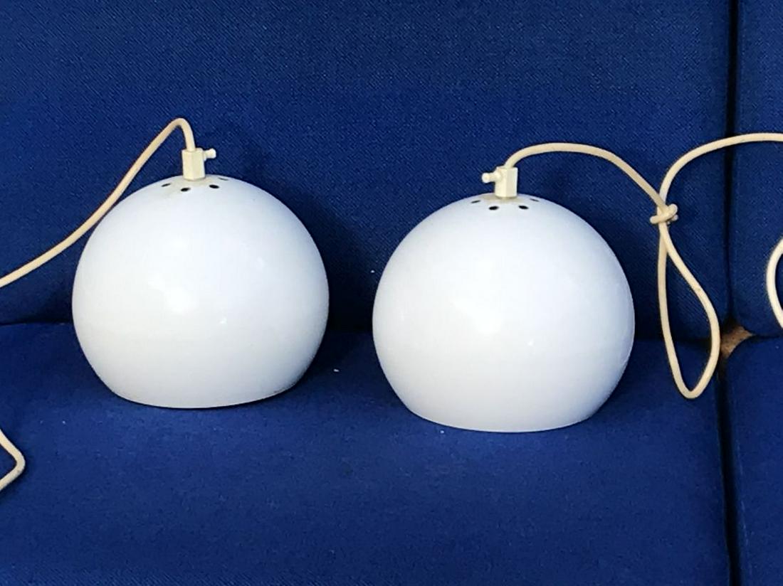 A PAIR OF MID CENTURY MODERN GLOBULAR PENDANT LAMPS 8": A PAIR OF MID CENTURY MODERN GLOBULAR PENDANT LAMPS 8" D. PROPERTY FROM THE ESTATE OF LEIF WESSMAN